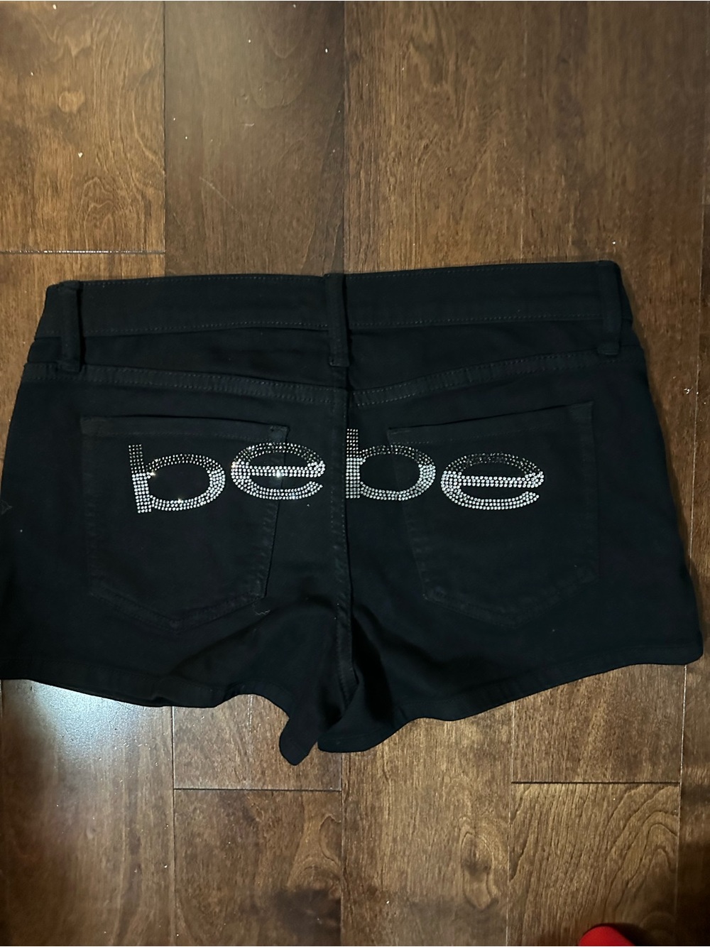 bebe Black Stretch Denim Shorts with Rhinestone Logo